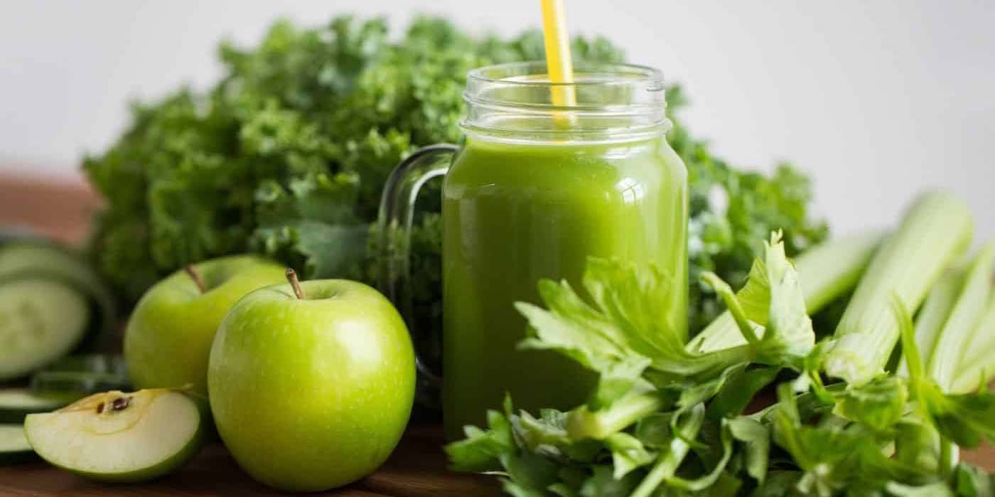 A glass of green juice